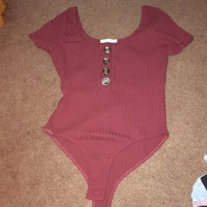 Burgundy body suit with buttons